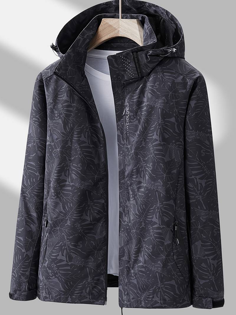 Freya hooded leaf print rain jacket in black, front view on hanger