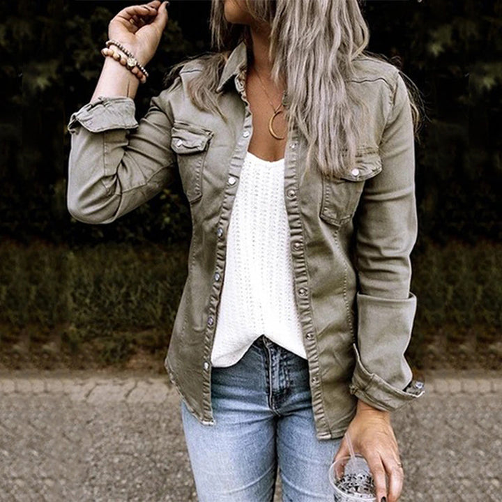 Isla denim jacket front view with collar and chest pocket detail