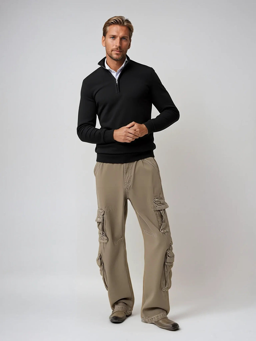 Sebastian black half-zip jumper, full body styled with cargo trousers