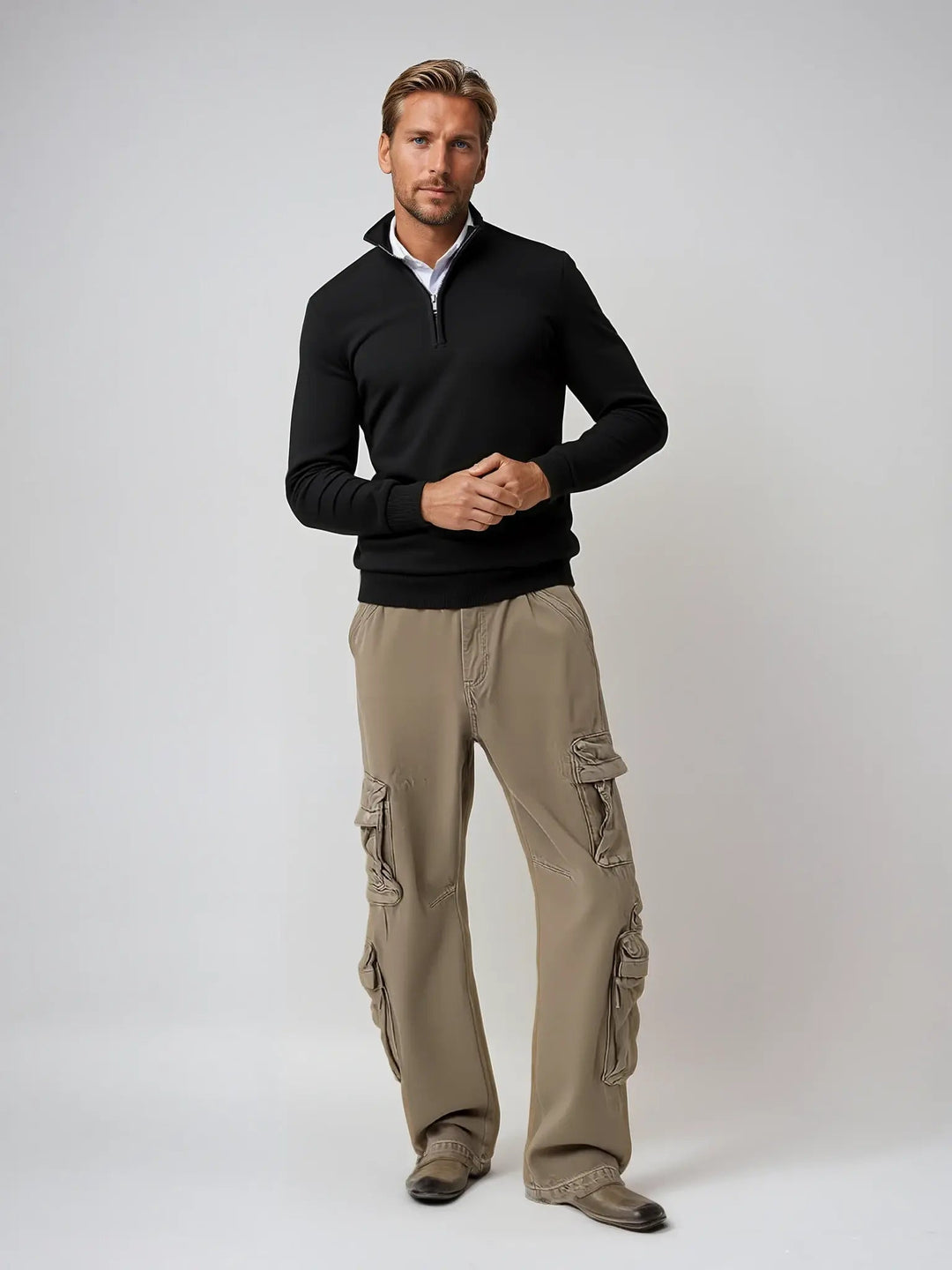 Sebastian black half-zip jumper, full body styled with cargo trousers