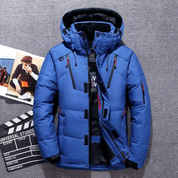 Caspian insulated winter parka in blue, front view with hood up
