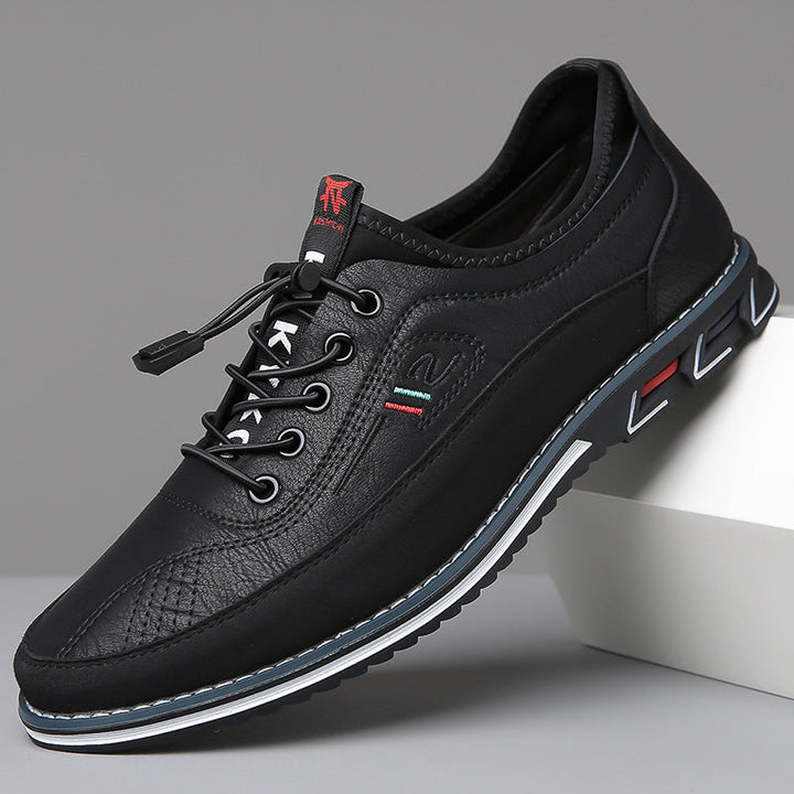 Edison men's casual shoe in grey with black sole, side view