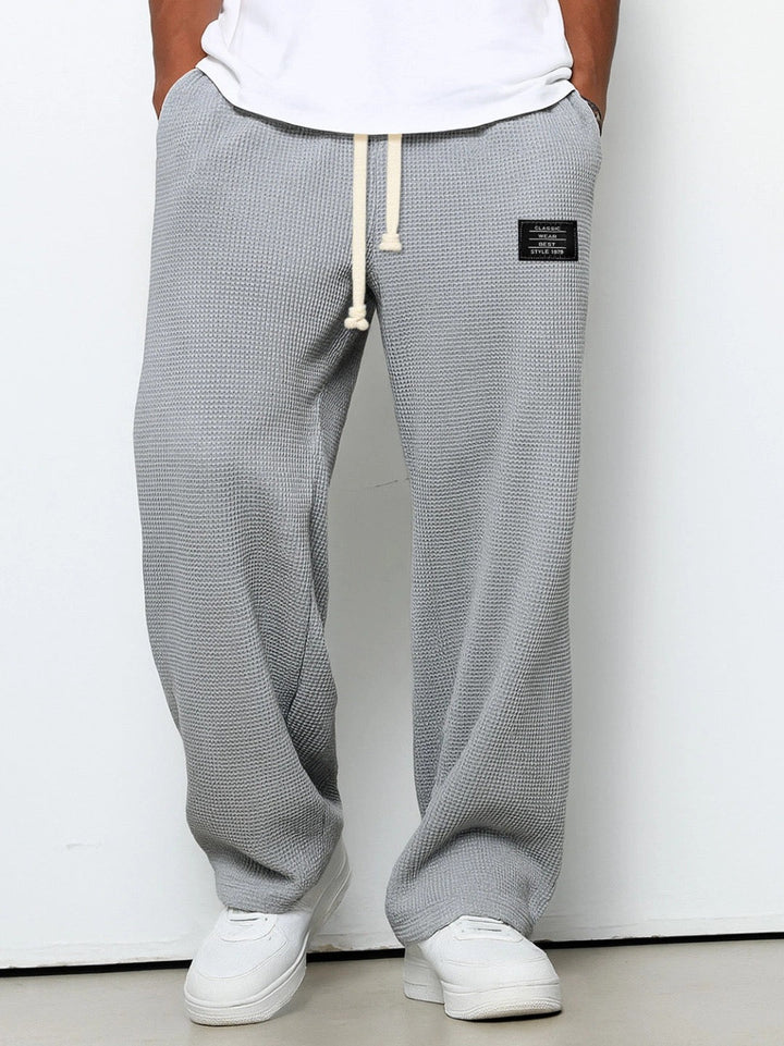 Huxley relaxed straight leg joggers in grey, front view