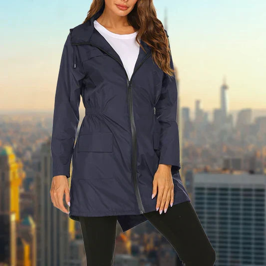 Poppy hooded rain jacket in navy blue, front view on model