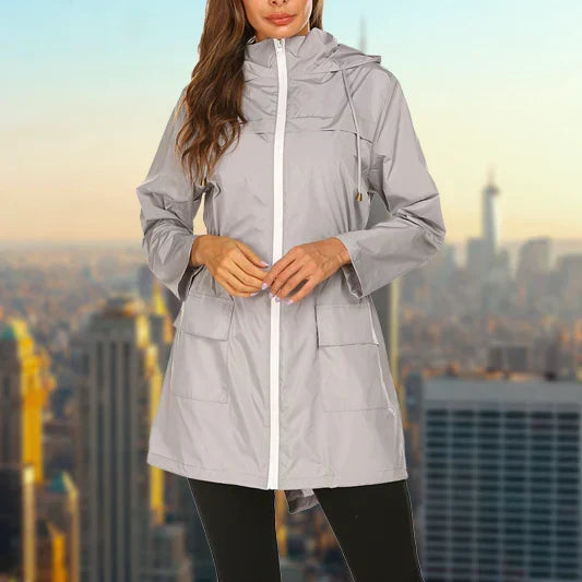 Poppy hooded rain jacket in grey, front view on model