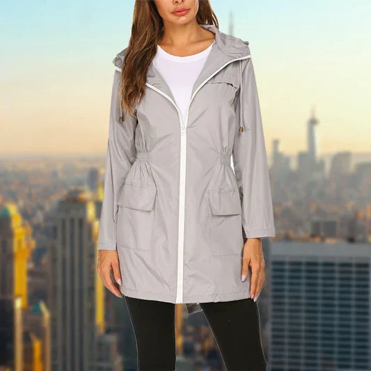 Poppy grey rain jacket close-up showing zip and pockets