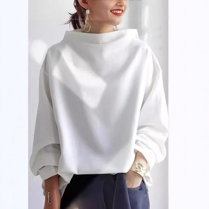 Wilhelmina white high-neck long sleeve top, front view smiling