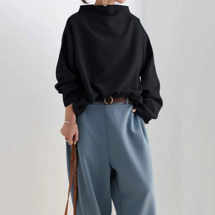 Wilhelmina white high-neck long sleeve top, front view smiling
