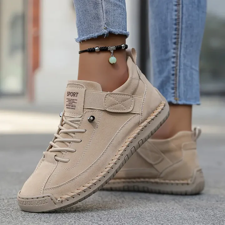 Hollis wide fit lace-up sneakers, side view on model
