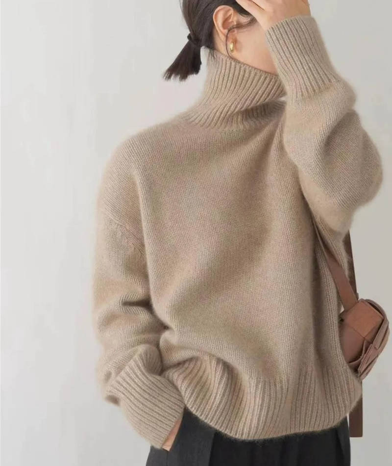 Marigold turtleneck jumper in beige, front view with crossbody bag