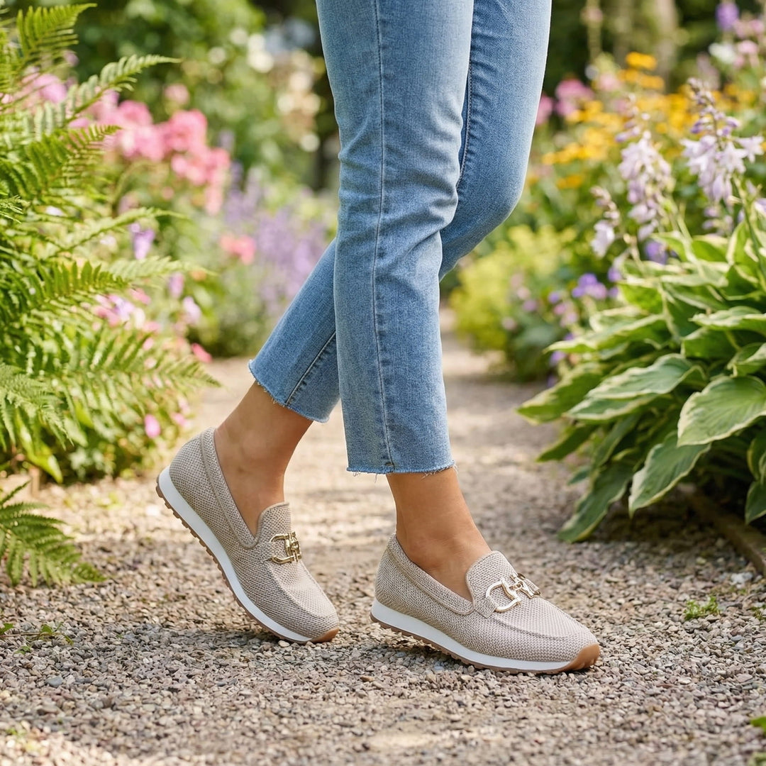 Beatrix slip-on loafer trainers in blue worn on feet, front view