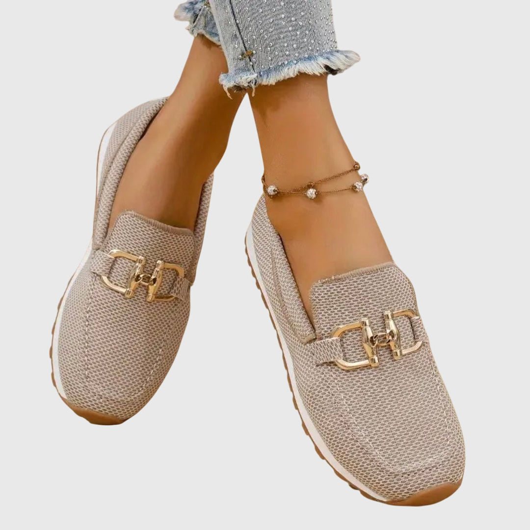 Beatrix slip-on loafer trainers in blue worn on feet, front view