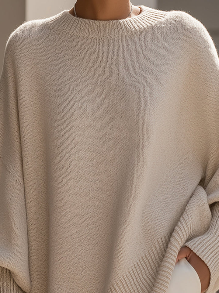 Close-up of Imogen's ribbed crew neckline and knit texture